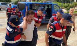 Eşinin boğazını kesen kocaya tahliye