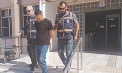 Eşine saldırırken polise yakalandı